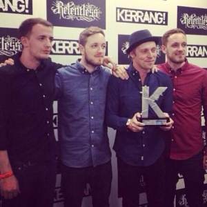 Architects collecting their award.